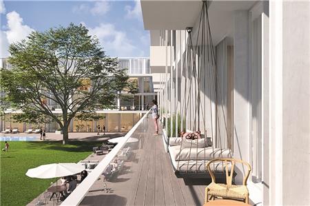 Fotomontage der geplanten Hotelanlage „LUV“ auf Norderney: Blick von der Balkongalerie auf den offenen Innenhof mit Thalassogarten.
